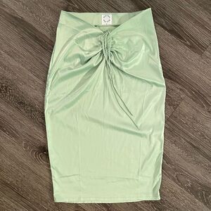 With jean lime green skirt